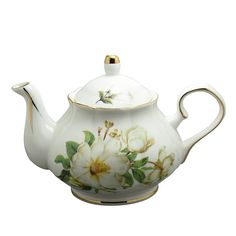 a white tea pot with flowers painted on the side and gold trimming around it