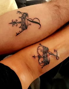 two people with matching tattoos on their legs