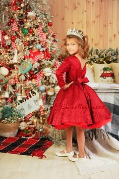 This is the most beautiful red Christmas baby dress, it shimmers and sparkles like a scattering of precious stones. A sparkling red sleeveless baby dress made from soft jersey with sequined lurex, with a stunning V-neck at the back and a bow. The tulle tutu petticoat is very puffy. Absolutely chic dress, simple but elegant! DRESS IN STOCK, READY TO SHIP! In this catalog you can see this dress with long sleeves and without sleeves.  And also a dress can be made both with long sleeves and short sl Little Princess Dress, Ball Costume, Sparkling Dress, Xmas Dress, Christmas Dress Baby, Trendy Christmas Outfits, Dress Tutu, Dress Birthday, Long Sleeve And Shorts