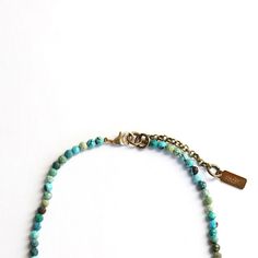 This delicate turquoise necklace is perfect for layering. Made with delicate faceted Arizona turquoise, and a gold-filled clasp. Luxurious, light-weight, it will stay on your neck forever! Turquoise is associated with the 5th Chakra, located at the throat and it represents knowledge, and divine guidance. It is also an aide in communication, in synchronizing what we mean to say with what is actually said. Necklace measurements: Length of necklace is 15 inches, extends to 16 inches Bead size: 3mm Turquoise Faceted Amazonite Jewelry, Faceted Turquoise Amazonite Jewelry, Turquoise Single Strand Necklace In Amazonite, Turquoise Amazonite Single Strand Necklace, Adjustable Faceted Turquoise Necklace, Everyday Bohemian Turquoise Necklace, Turquoise Necklace With Natural Stones For Everyday, Everyday Turquoise Necklace With Natural Stones, Everyday Minimalist Turquoise Necklace