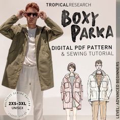 a man in white pants and jacket standing next to a sign with the words boxy parka on it