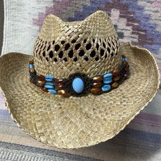 Add a touch of western and boho style to your outfit with this turquoise and brown hat band from MDream. The adjustable slide feature allows for a comfortable fit on any size cowboy hat, making it perfect for travel, weddings, or any casual or formal occasion. The colorful beads on canvas fabric give a unique and personalized touch, while the Southwest pattern adds a bit of rustic charm. Whether it's winter, summer, fall, or spring, this hat band is a versatile accessory that can complete any outfit. Handmade in China, this hat band is not signed, but its quality and attention to detail speak for themselves. SEE OUR STORE FOR MANY MANY DIFFERENT TYPES OF GIFTS  WE ALSO CARRY BOLO TIES CAMEO JEWELRY WESTERN JEWELRY WESTERN WEAR ANTIQUES PRECIOUS MOMENTS VINTAGE FISHING LURES VINTAGE HARLEY Beads On Canvas, Handmade Turquoise Jewelry, Southwest Pattern, Turquoise And Brown, Vintage Fishing Lures, Brown Hat, Vintage Hot Wheels, Chapeau Cowboy, Black Snapback