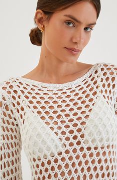 This beautiful open-stitch dress with long sleeves looks great as you scroll the boardwalk after a swim. Slips on over head Boat neck Long sleeves Sheer 100% rayon Hand wash, dry flat Made in Brazil Hispanic & Latinx Owned/Founded Vacation Long Sleeve Pointelle Knit Crochet Top, Long Sleeve Pointelle Knit Crochet Top For Vacation, Summer Crochet Top With Long Sleeves And Open Knit, Summer Long Sleeve Open Knit Crochet Top, Long Sleeve Open Knit Crochet Top For Beach Season, Open Knit Long Sleeve Crochet Top For Beach Season, Long Sleeve Open Knit Crochet Top, Long Sleeve Crochet Top For Beach Vacation, Long Sleeve Crochet Dress As Beach Cover-up