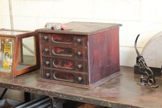 You're looking at an antique, 4-drawer Goff's Braid thread cabinet/ flat file dating to approx the 1900s. All the drawers operate smoothly and possess their original hardware. The rear is hand painted with "Goff's Brand - Best Made". This piece is small enough to fit on the top of your desk while being large enough to handle reasonable sized prints inside. A great piece for storing artwork, maps, prints, stamps, photographs etc. This item shows wear commensurate with age including marks, dings, Storing Artwork, Flat File, Bespoke Bathroom, Flat Files, Wood Knobs, Storage Items, Desk Storage, Cool Things To Make, Office Desk