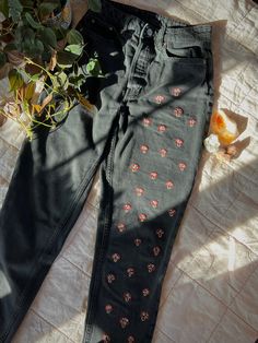 they say size 6 but they're old H&M jeans - meaning they're more like a size 2/4. I have a 25 inch waist & they fit me well, need a belt though. straight leg, high waisted button fly.  hand embroidered mushrooms by me! note: these are pre-owned & may have some minor flaws, but i look for the best quality jeans. Embroidered Dark Wash Jeans For Fall, Fall Season Embroidered Dark Wash Jeans, Fall Embroidered Relaxed Fit Jeans, Embroidered Dark Wash Straight Leg Bottoms, Embroidered Straight Leg Dark Wash Bottoms, Mushroom Jeans, Embroidered Mushrooms, Just Aesthetic, Diy Crafts To Do