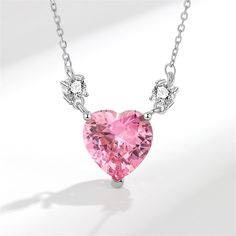 Silver-plated necklace featuring a bold crystal pendant. Chain : 15.75" L with 1.96" extender Pendant : 0.47" W x 0.5" H Lobster claw clasp Silver-plated copper / crystal / cubic zirconia Copper Crystal, Heart Shaped Necklace, Silver Plated Necklace, Accessories Jewelry Necklace, Pink Crystal, Heart Pendant Necklace, Silver Heart, Crystal Pendant, Crystal Jewelry