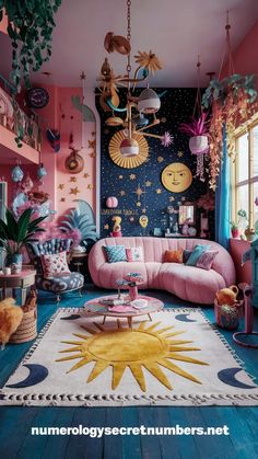 a living room filled with pink furniture and lots of decorations on the wall above it