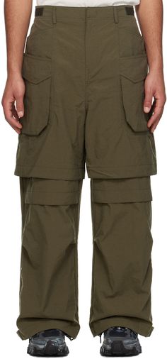 Crinkled nylon canvas trousers. · Layered construction · Adjustable hook fastenings at waistband · Belt loops · Zip-fly · Four-pocket styling · Detachable panel at legs for alternate styling · Adjustable press-stud tab and zip vent at cuffs · Cargo pocket at outseams Supplier color: Khaki Utility Nylon Parachute Pants With Belt Loops, Green Utility Nylon Cargo Pants, Khaki Military Style Cargo Pants With Side Pockets, Military Style Khaki Parachute Pants With Patch Pockets, Outdoor Full-length Cargo Pants With Patch Pockets, Military Nylon Cargo Pants With Cargo Pockets, Juun J, Green Cargo Pants, Cargo Pocket