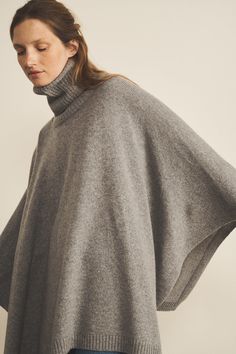 The Angela cashmere poncho has a great sentimental value for Linnea Lund : it has been conceived in honour of our founder’s sister and her infinite quest for elegance, comfort and warmth. With a cashmere so soft that easily compares to a warm embrace, this poncho has become a must-have for those who want to feel as if they were bundled up in a cocoon of softness.Charlotte’s fashion tip: “This poncho is a must-have in the Swedish wardrobe. It is perfect to wear outdoors as well as at home with a comfy, loungewear outfit. My styling tip to look casual yet sophisticated : choose a raw denim jeans, add a cashmere pullover then your Angela poncho and put the finishing touches to your outfit with the Maya collar scarf.” Lenght: 68cm ~ 26,77 inches Oversized Cashmere Cape With Long Sleeves, Elegant Oversized Wool Poncho, Oversized Long Sleeve Cashmere Poncho, Cozy Long Sleeve Cashmere Poncho, Cashmere Cape For Layering In Fall, Cashmere Cape For Fall Layering, Oversized Wool Poncho For Layering, Fall Cashmere Cape For Layering, Oversized Cashmere Poncho