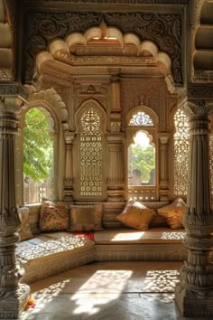 an ornate sitting area in the middle of a building