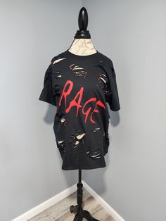 a t - shirt with the word rage printed on it