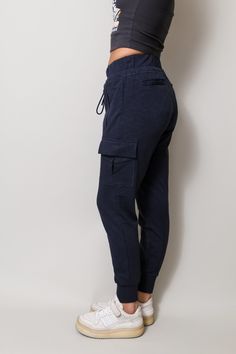 Our women's french terry sweatpant is the perfect combination of comfort, style, and functionality. You will love the multiple pockets to hold your phone and other small items. Whether you are headed to the gym or out and about our ladies sweatpant is easy to live in and be super comfortable at the same time. Available in Navy, Heather Grey or Black 53% polyester, 36% cotton, 6% Viscose, 5% Eastane, exclusive of trim. More Details: Features 2 front pockets with zippered closures, 2 back pockets Dream Note, Social Awareness, Human Connection, Out And About, Pocket Pants, Comfort Style, Work Outfits, Small Items, The Gym