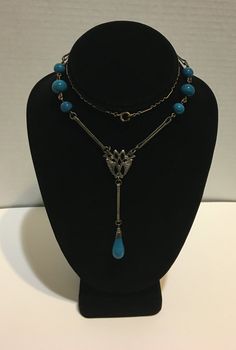 "Unique! Antique Art Deco piece blue Czech bead lariat necklace never seen one like it the measures 22\" long and hangs down 3.75\" pendant in very good condition." Blue Adjustable Long Drop Jewelry, Blue Lariat Jewelry With Adjustable Chain, Blue Lariat Necklace With Adjustable Chain, Blue Long Lariat Necklace With Adjustable Chain, Elegant Blue Beaded Necklace With Adjustable Chain, Blue Lariat Necklace For Gift, Adjustable Blue Lariat Necklace, Blue Adjustable Lariat Necklace, Blue Long Drop Necklace As A Gift