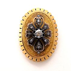 ad eBay - Georgian 18K Yellow Gold and Sterling Silver Diamond Large Brooch Pin. Hallmarks: tested as 18k gold and diamonds set. aprox. 10ct, 12 smaller rose. Diamond Specs: 1 center. in sterling silver. Condition: excellent antique condition. Engraved Yellow Gold Brooches For Anniversary, Antique Yellow Gold Brooch For Anniversary, Ornate Rose Cut Diamond Brooches For Weddings, Antique Yellow Gold Anniversary Brooch, Heirloom Yellow Gold Brooches With Rose Cut Diamonds, Luxury Heirloom Brooches With Rose Cut Diamonds, Vintage Gold Brooches With Rose Cut Diamonds, Vintage Yellow Gold Brooches With Rose Cut Diamonds, Antique Gold Brooches With Rose Cut Diamonds