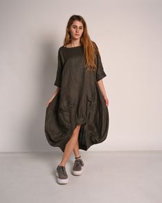 ☀  SUMMER extravagant dress Dark green  summer 100% linen dress. Casual new fashion trend.  Amazing summer dress. Comfortable and unique. Linen dress with big pockets. Fabric: 100% Linen Color: Dark green The dress is available in a very wide variety of colors. All clothes are handmade. 💨 EXPRESS SHIPPING Leave your phone number for couriers. Express shipping 2-3 days with DHL. https://www.etsy.com/listing/713478996/ ◾ If you would like any changes related to the garment, please contact us. Ple Spring Vacation Lagenlook Linen Dress, Green Relaxed Fit Linen Beach Dress, Green Linen Dress With Relaxed Fit For Summer, Green Linen Dress With Relaxed Fit For Vacation, Green Relaxed Fit Linen Dress For Vacation, Casual Khaki Linen Dress, Green Linen Lagenlook Dress, Casual Linen Dress With Asymmetrical Hem, Summer Lagenlook Linen Dress