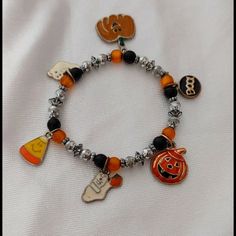 Cute Small Halloween Stretch Charm Bracelet Adjustable Black Bracelets For Halloween, Halloween Novelty Black Bracelets, Halloween Black Charm Bracelet, Adjustable Black Novelty Charm Bracelet, Black Adjustable Charm Bracelet, Novelty Style, Novelty Orange Bracelets For Halloween, Halloween Novelty Orange Bracelets, Black Themed Bracelet For Halloween, Halloween Themed Black Bracelet