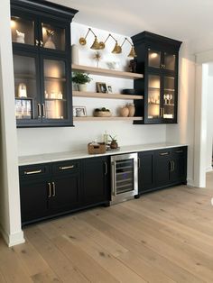 Cabinets are Tricorn Black by Sherwin Williams Wine Bar Room Ideas, Dry Bar Black Cabinets, Black Kitchenette Cabinets, Wine Cabinets In Kitchen, Black Cabinet Basement Bar, Black Cabinet Bar Ideas, Diy Bar With Cabinets, Built In Bar Cabinets For Home, Built In Shelves Bar