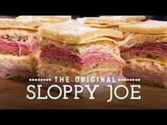 the original sloppy joe sandwich is cut in half and stacked on top of each other