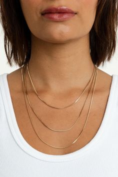 Add a charm or wear it on its own—the Bowie Chain is perfect for both layering and wearing solo. Its versatile design makes it an essential piece for any jewelry collection, effortlessly transitioning from a subtle accent to a standout statement. 18k gold-plated brass 2mm chain width Available in 3 lengths 15" - 16" 18" - 19" 21" - 22" **Does not pair with the Gianna, Harlyn, Radiant, Scarlett, or Pave Initial Charms Classic Everyday Charm Necklaces In 14k Gold Filled, 14k Yellow Gold Jewelry With Delicate Chain, Gold Layered Snake Chain Necklace, Yellow Gold-plated Delicate Chain Jewelry, Timeless Charm Necklace With Adjustable Chain For Everyday, Yellow Gold Plated Jewelry With Delicate Chain, Delicate Yellow Gold-plated Chain Jewelry, Fine Jewelry With Adjustable Chain, Fine Jewelry Layering Pieces With Adjustable Chain