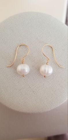 Handmade Statement Earrings with Large Freshwater Pearls, Gold Fill and Freshwater Pearl Earrings Large AAA grade cream-colored round-shaped Freshwater pearls with handcrafted ear wires.  Handcrafted with love and care. Each gemstone and pearl is a work of nature and no two are exactly alike, please allow for some variation in the tone and color. Minor inclusions or surface irregularities are also completely normal and should not be considered a defect. Should you find yourself to be unhappy wit Classic Hypoallergenic Pearl Earrings, Everyday Round Hypoallergenic Pearl Earrings, Everyday Hypoallergenic Round Pearl Earrings, Handmade Classic Pear-shaped Pearl Earrings, Classic Adjustable Drop Pearl Earrings, Classic Handmade Pear-shaped Pearl Earrings, Pearl White Round Earrings For Everyday, Adjustable Round Pearl Earrings For Anniversary, Everyday White Pearl Drop Earrings