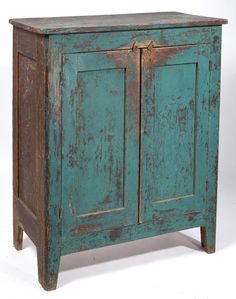 an old wooden cabinet with two doors and one door open on the bottom, against a white background