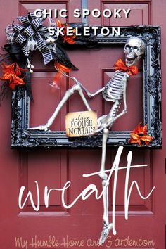 a skeleton is standing in front of a red door with the words wreath written on it