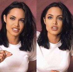 a woman with long black hair wearing a white t - shirt and posing for the camera