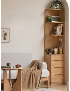 a living room filled with furniture and a book shelf