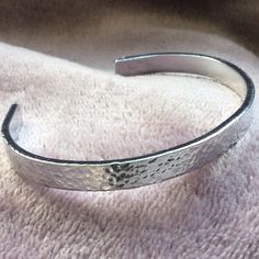 Our beautiful textured aluminium adjustable bracelets are the perfect gift for anyone, either to send as a gift or keep for yourself. These bangles are lightweight and come in a choice of three thicknesses.  The bangles can be gently bent to fit any size wrist by pinching the ends together.  The bangles are unique as they are made just for you! - making a statement while still being versatile enough to go with any outfit. We handcraft every product to order and aim to have it ready to within 3 t Silver Hammered Metal Bangle, Hammered Metal Bracelets, Silver Adjustable Band Bracelet As Gift, Silver Adjustable Band Bracelet For Gift, Silver Hammered Metal Cuff Bracelet, Hammered Metal Bangle As Gift, Hammered Metal Cuff Bracelet Gift, Hammered Metal Cuff Bracelet As Gift, Hammered Metal Bangle Gift