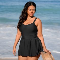 Get ready to make a splash in this Plus Size Scoop Neck Ruffled Swim Dress One Piece Swimsuit from Cupshe. Featuring a flirty ruffled design, a classic v-neckline and adjustable straps, this swimsuit doesn't just flatter, it frills—delivering poolside glamour and confidence in every wave you catch. Whether you're lounging by the pool or hitting the beach, this swimsuit is the perfect choice for the confident and stylish woman who loves to stand out from the crowd. Product code: DGA12M3K001AA/DGA Black Sleeveless Swim Dress For Pool, Black Sleeveless Swim Dress For Beach Party, Fitted Black Swim Dress For Beach Party, Black One-piece Summer Dress, Sleeveless Black Tankini For Beach Party, Black One-piece Swim Dress For Beach, Black One-piece Swim Skirt For Beach, Flirty Black Sleeveless Swimwear, Flirty Sleeveless Black Swimwear