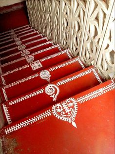 red and white table cloths with designs on them