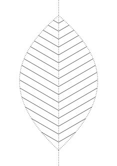 an ornament with lines drawn on it to make the shape of a leaf