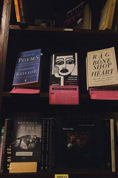 several books on a shelf in a room