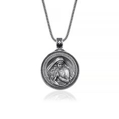 Introducing the Miraculous Virgin Mary Necklace. This beautiful piece is handmade from high quality 925 sterling silver and makes a stunning addition to any jewelry collection. The intricate details and craftsmanship are truly remarkable and the necklace is sure to become a treasured keepsake. The Virgin Mary is a powerful symbol of faith and protection and wearing this necklace is a wonderful way to show your devotion. Whether you choose to keep it for yourself or give it as a gift, the Miracul Spiritual Engraved White Gold Jewelry, Engraved Spiritual White Gold Jewelry, Engraved White Gold Spiritual Jewelry, Spiritual Sterling Silver Medallion Jewelry, Sterling Silver Medallion Necklace With Silver Clasp, Spiritual 925 Stamped Medallion Necklaces, Spiritual Medallion Necklace Stamped 925, Spiritual Medallion Necklace In Sterling Silver, Spiritual Medallion Necklaces Stamped 925