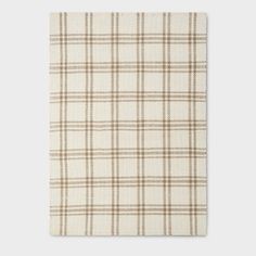 a white and brown plaid fabric