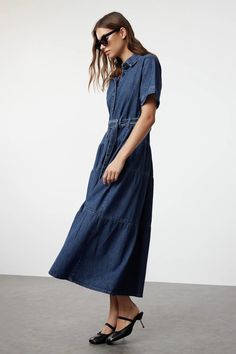 Stylish Belted Blue Jean Maxi Dress | Trendy Belted Jean Dress | Mid-Sleeve Belted Jean Dress | Knee-Length Casual Shirt Collar Denim Dress ✔️Colors may vary due to light differences in studio shootings. ✔️Wrinkles may occur during the shipping process. After receiving your clothing, you can wear it neatly like the model if you use a steam iron afterward. ✔️Model's Measurements: Height: 174 cm (5'9'') Bust: 83 cm (32 in) Waist: 60 cm (23 in) Hips: 89 cm (35 in) The model is wearing a size S/36/8 Casual Short Sleeve Cotton Denim Dress, Belted Medium Wash Dress For Work, Denim Midi Dresses For Work, Denim Midi Workwear Dress, Denim Blue Dress With Pockets And Relaxed Fit, Blue Denim Short Sleeve Dress, Indigo Dresses For Summer Workwear, Denim Dress With Relaxed Fit For Workwear, Workwear Denim Dresses With Relaxed Fit