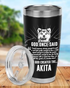 a stainless steel tumbler with the words god once said and an image of a dog on it