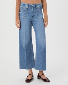 This ultra high-waisted wide leg has an easy, relaxed fit and an ankle length silhouette. This pair is crafted from our PAIGE VINTAGE denim in the perfect light wash with lived-in distressing, natural fading, set in front pockets, double belt loops and a raw hem. PAIGE Vintage takes all of the work out of breaking in your favorite pair of vintage jeans. We've combined the comfort of stretch with everything you love about authentic vintage denim to create super soft jeans that feel perfectly lived-in from the very first wear. Medium Wash Wide Leg Cropped Jeans For Fall, Fall Wide Leg Cropped Jeans In Medium Wash, Fall Light Wash Wide Leg Cropped Jeans, Light Wash Wide Leg Cropped Jeans For Fall, Relaxed Fit Cropped Flare Jeans In Light Wash, Relaxed Fit Light Wash Cropped Flare Jeans, Relaxed Fit Cropped Light Wash Flare Jeans, Wide Leg Washed Cropped Jeans For Spring, Light Wash Cropped Jeans For Fall