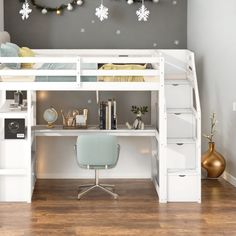 a white loft bed with desk underneath it and christmas decorations on the wall behind it