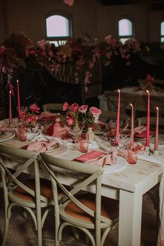 wedding reception table decor with coloured glass goblets, taper candles and wicker place mats Romantic Red And Pink Wedding, Colourful Vases Wedding, Pink And Red Wedding Table Setting, Pink And Red Wedding Theme Receptions, Bright Pink Wedding Table Settings, Candle Table Setting, Pink Table Settings, Wedding Candles Table, Round Wedding Tables