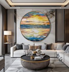 a living room filled with furniture and a large painting on the wall above it's coffee table