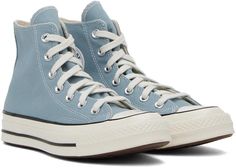 Converse.Blue Chuck 70 High Top Sneakers.High-top canvas sneakers in blue..· Rubber cap toe.· Lace-up closure.· Logo and eyelets at inner side.· Rubberized logo patch at heel.· OrthoLite™ padded footbed.· Treaded rubber sole.· Contrast stitching in white.Supplier color: Cocoon blue.Upper: textile. Sole: rubber..Made in Viet Nam..232799M236073 Blue Converse Cotton High-top Sneakers, Blue Cotton Converse High-top Sneakers, Blue Cotton Sneakers With Laces, Blue Converse Canvas High-top Sneakers, Blue Converse High-top Canvas Sneakers, Blue Converse Canvas Sneakers, Canvas Shoes With White Sole And Rubber Heel Cap, White-sole Canvas Shoes With Rubber Heel Cap, Blue Canvas High-top Sneakers With Gum Sole