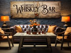 a living room filled with furniture and a wooden sign on the wall above it that says smith's whiskey bar