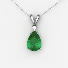 This emerald sterling silver 925 necklace presents an emerald gemstone (2.7 carats) accented by white diamond. The lab-created gemstones (including a pear-shaped May birthstone - green emerald) are set in a solid sterling silver teardrop-style pendant setting (handmade in USA). Ships in a beautiful gift box. Main Gemstone: Emerald Main Gemstone Size: 10 x 7 mm Main Gemstone Weight: ~2.7 Carats Main Gemstone Color: Green Main Gemstone Origin: Lab-Created Setting Metal: Solid 925 Sterling Silver Teardrop Diamond Emerald Necklace For Anniversary, Teardrop Emerald Necklace With Diamond For Anniversary, Fine Jewelry Emerald Teardrop Diamond Necklace, Green Emerald Diamond Necklace For May Birthstone, Classic Silver Diamond Necklace With Emerald, Classic Silver Diamond Emerald Necklace, Formal Diamond Necklace For May Birthstone, Classic Pear-shaped Emerald Jewelry, Emerald Teardrop Pendant Necklace For Anniversary