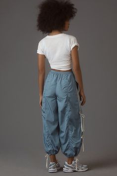 We have found this style runs large; we recommend sizing down for an ideal fit Nylon Side slant pockets Back pockets Pull-on styling Machine wash Imported | Full Twist Pants by Daily Practice by Anthropologie in Blue, Women's, Size: S P, Nylon Mid-rise Stretch Parachute Pants With Pockets, Athleisure Nylon Bottoms With Cargo Pockets, Nylon Athleisure Bottoms With Cargo Pockets, Spring Nylon Straight Leg Bottoms, Athleisure Parachute Pants With Loosely Fitted Hips, Athleisure Parachute Pants With Loosely Fitted Hips And Pockets, Athleisure Parachute Pants With Side Pockets And Loose Fit, Stretch Mid-rise Parachute Pants With Cargo Pockets, Nylon Parachute Pants With Relaxed Fit