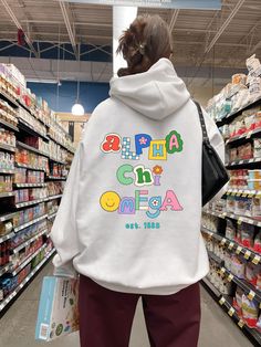 Soft, cute, and trendy, this Alpha Chi Omega hoodie will quickly become your go-to cozy sweatshirt! Use the drop down to specify preference between white, black, sand, dark chocolate, irish green, light blue, royal, light pink, or heliconia.  LISTING IS FOR ALPHA CHI OMEGA. Please be sure you are ordering for your correct Sorority.  We print on high quality, soft, & heavyweight materials, sustainably made and printed in the US. ♥ SIZING ♥ Unisex Sizing- For a more feminine, fitted look we recommend getting your size. For a more oversized look, we recommend sizing up. ♥ SHIP TIME ♥ Items may take up to 7 business days to process before shipping. Shipping time is (on average) an ADDITIONAL 2-5 business days. Shipping times vary for many reasons, but is largely influenced by your location. ♥ Doodle Scrapbook, Big Little Sorority, Alpha Epsilon Phi, Theta Phi Alpha, Kappa Alpha Theta, Alpha Sigma Alpha, Alpha Chi Omega, Gamma Phi, Sigma Kappa