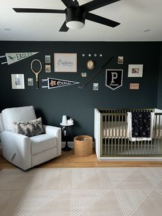 a baby's room decorated in black and white