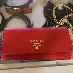 Like New Red Prada Bag Not A Single Scratch In Sight Very Very Gently Worn Comes With Red Chain, Red Wallet To Attract Money To Be Used As Wallet Or Crossbody Willing To Negotiate Send An Offer Luxury Red Pouch Bag, Classic Red Wallets With Removable Pouch, Red Luxury Wallet For Everyday Use, Red Crossbody Travel Wallet, Luxury Red Wallet With Removable Pouch, Designer Red Wallet For Travel, Classic Red Pouch Clutch, Luxury Red Clutch With Removable Pouch, Luxury Red Clutch Wallet