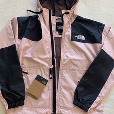 Nwt The North Face Jacket In Pink And Black Women's Size Xs Drawstring Hood Logo Embroidery On Front And Back Zip Side Pockets Elastic Cuffs Toggle Hem Relaxed Fit Nylon: Smooth, Crisp And Wrinkle-Resistant Mesh Lining Main: 100% Polyester. Pink Hooded Outerwear For Outdoor, Pink Outerwear For Outdoor Activities In Fall, Pink Outerwear For Fall Outdoor Activities, Pink Fall Outerwear For Outdoor Activities, Pink Windbreaker For Outdoor Activities With Pockets, Casual Pink Outerwear For Hiking, Pink Winter Windbreaker For Streetwear, Pink Windbreaker For Winter Street Style, Pink Long Sleeve Outerwear For Outdoor