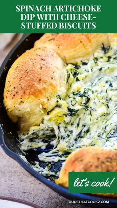 spinach artichoke dip with cheese stuffed biscuits in a cast iron skillet